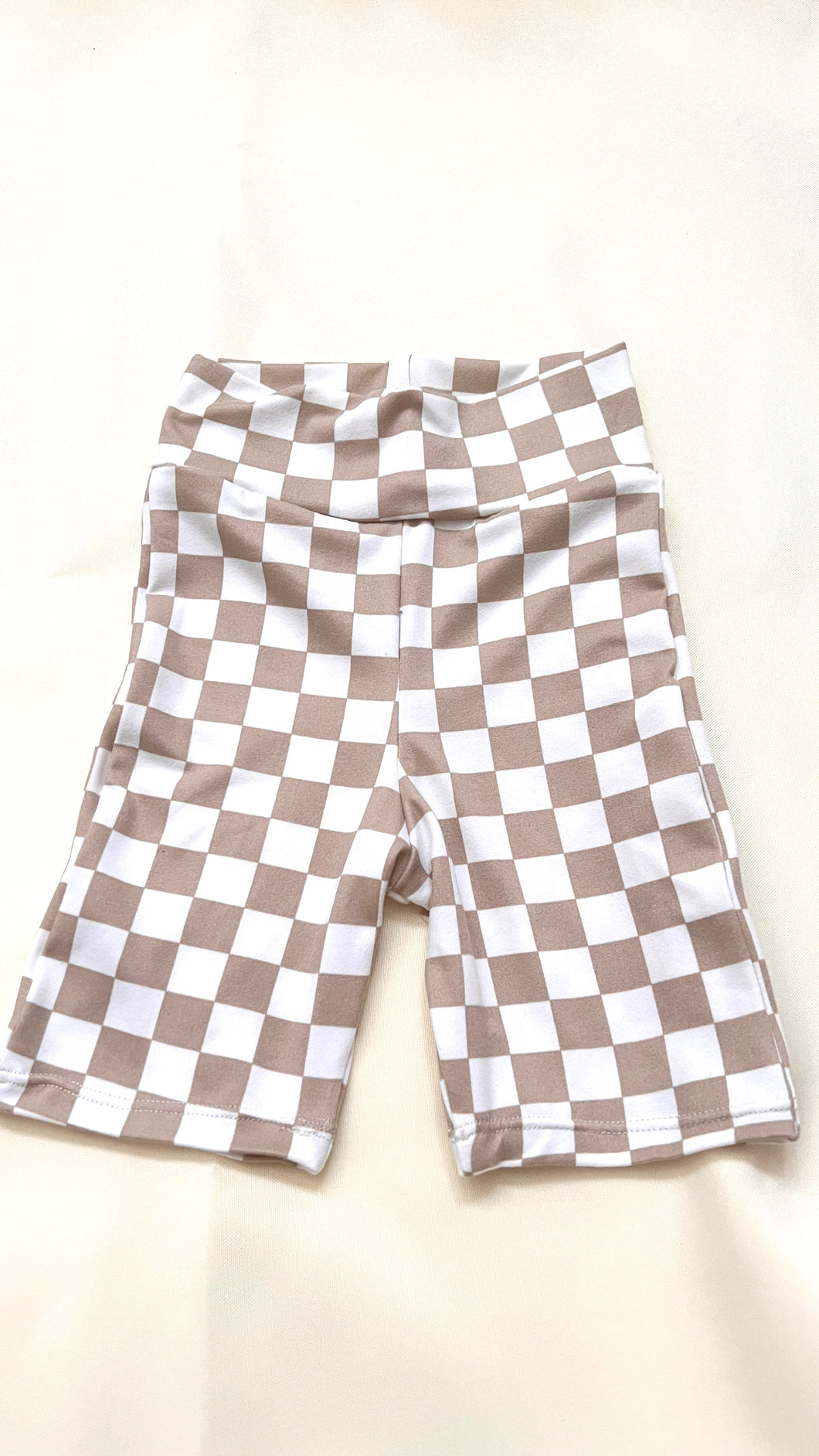Girls High Waisted Biker Shorts in Tan Checkered Print